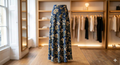 Elegant floral skirt with vibrant patterns and a flowing design.